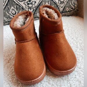 Brown boots in a size 9.5. New never used.